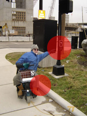 Pedestrian button too far away from the sidewalk.